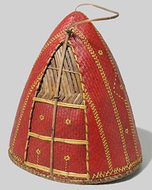 Canework hat ornamented with feathers